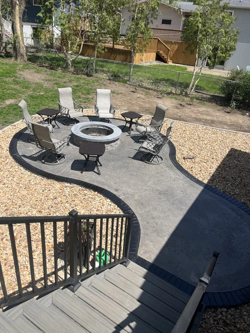 Patio with fire pit and curbing